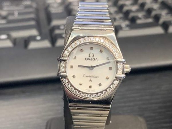 STAINLESS STEEL LADIES OMEGA WATCH WITH DIAMOND BEZEL