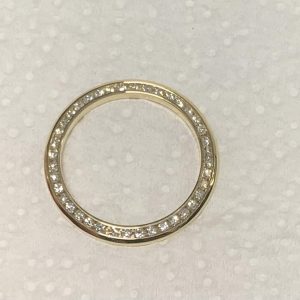 18K W/G LADIES DIAMOND BEZEL FOR A 26MM LADIES ROLEX, CONSISTING OF 1.00 CARAT OF CHANNEL SET ROUND BRILLIANT CUT ROUND DIAMONDS