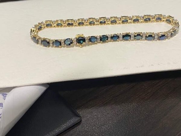 18K Y/G SAPPHIRE AND DIAMOND BRACELET 27 OVAL SAPPHIRES 5 X 4 MM 54 SMALL ACCENTING DIAMONDS 7.8DWT
