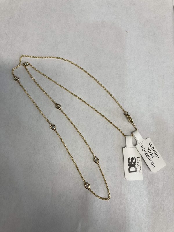 14K YELLOW GOLD DIAMONDS BY THE YARD NECKLACE W/ 6 ROUND LAB GROWN DIAMONDS WEIGHING APPROX. 0.34 TCW.          COLOR: E-F CLARITY: VS1-VS2 1.4 DWT. DIS#520571 COMES WITH CARD & POUCH.